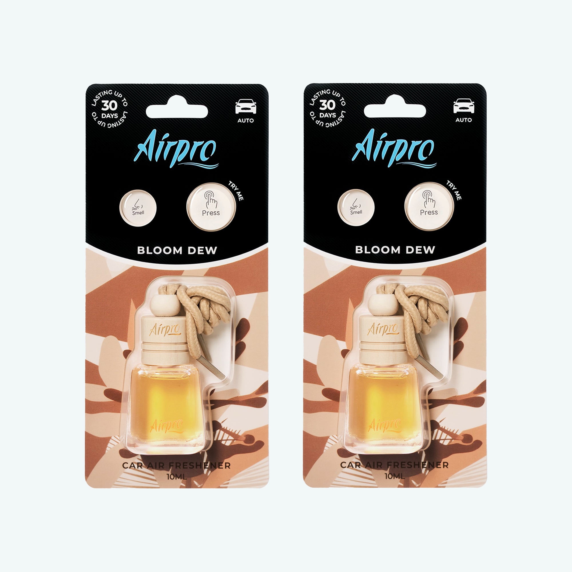 Front view of Airpro Bloom Dew 10ml glass bottle car air freshener in its premium retail blister packaging with a natural beechwood cap and hanging rope.